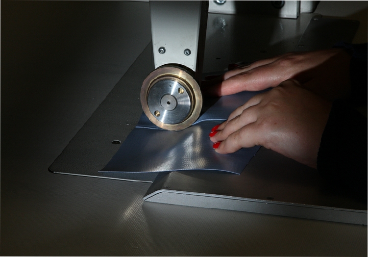 Photograph of High-Tech Laser heat-sealing machine used for the production of "Inteligent Clothing". Part of a series taken for Skillset