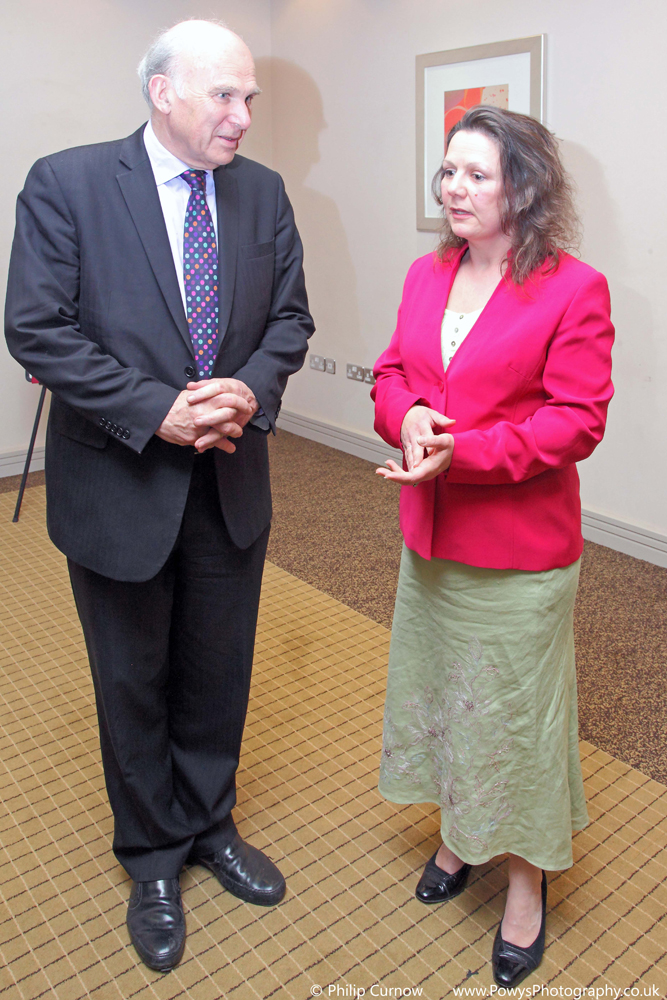 Vince Cable meeting Sue Green from Llandrindod Wells Chamber of Trade.