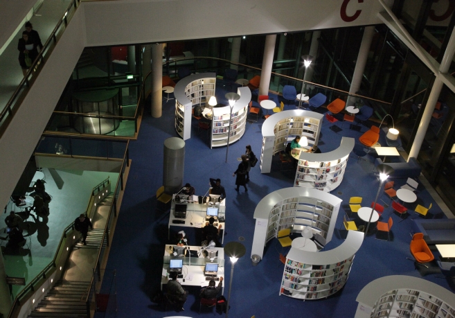 Photographs taken for the opening of the new, City Centre Campus in Newport.  End of the busy first day and the start of a quiet evening in the new library.