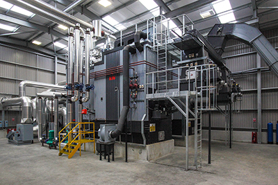 Photograph taken for owners of new Bio-mas heating plan